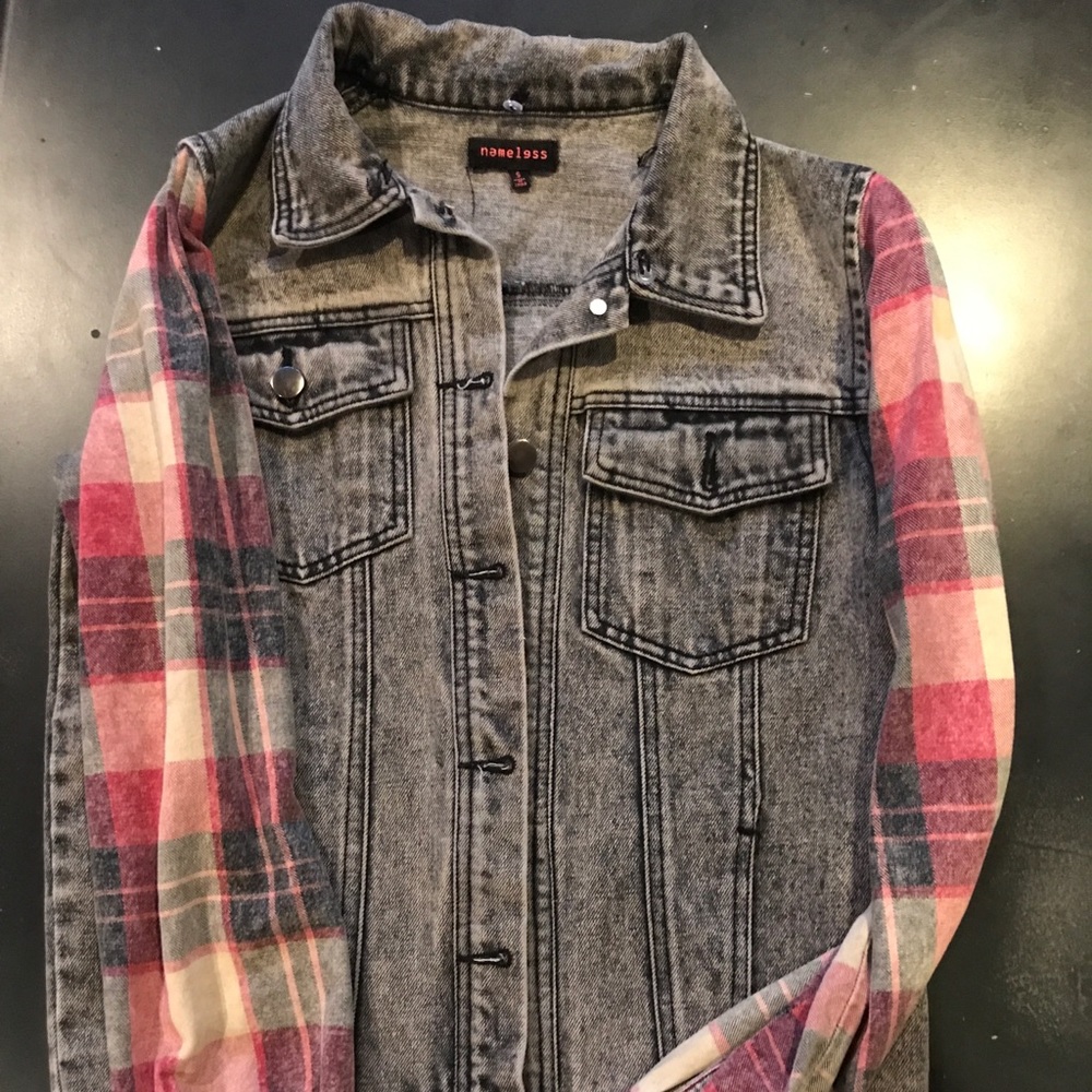 Grey jean jacket with flannel sleeves
